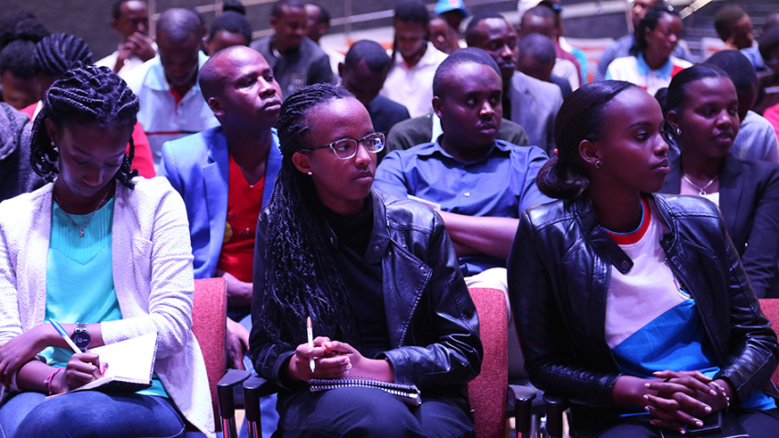 RPF youth  cadres follow proceedings at the RPF Headquaters in Rusororo yesterday. Sam Ngendahimana.