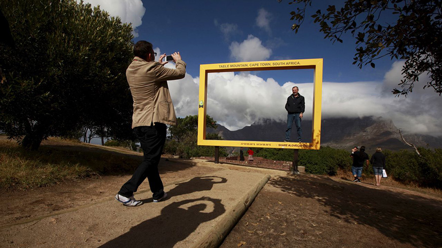 Tourists take pictures in Cape Town, South Africa. Net photo.