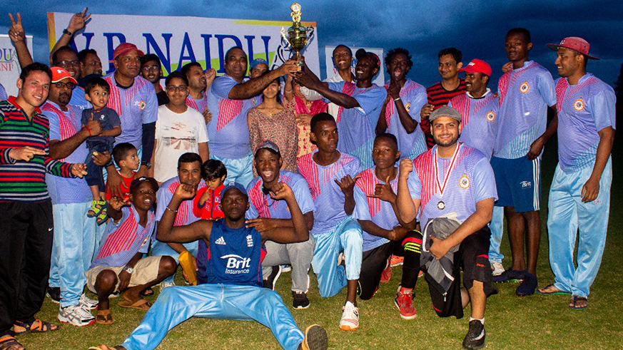 Challengers Cricket Club players in wild celebrations after lifting their fifth VR NAIDU title at Gahanga Oval on Sunday. Jejje Muhinde.