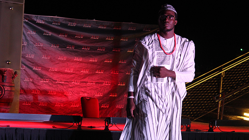 A model dons West African garb on the catwalk