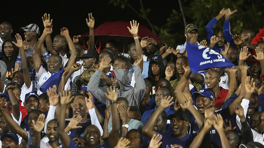 Rayon Sports supporters cheer on their players during the match