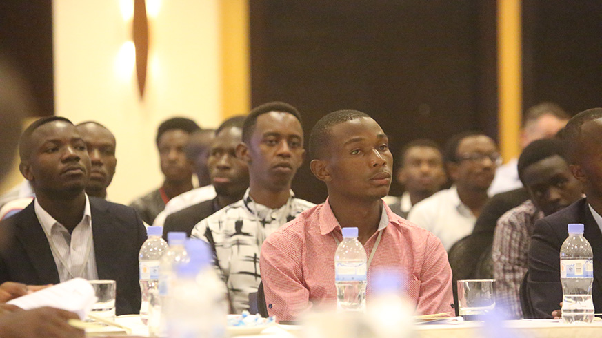 Participants follow the proceeding of the meeting in Kigali yesterday (Sam Ngendahimana)