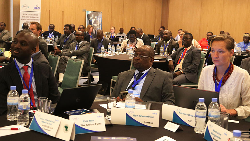 Participants follow the proceedings of the meeting in Kigali,  yesterday. 