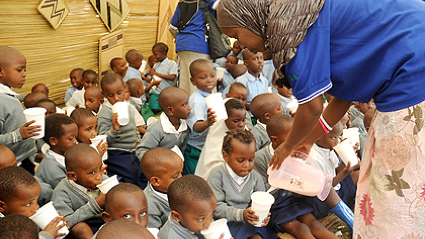 School childen being given Milk. File. 