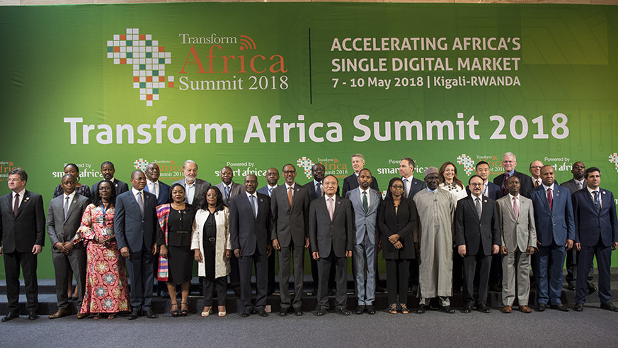 President Paul Kagame and other top dignitaries and delegates pose for a group photo after the opening of the fourth annual Transform Africa Summit at the Kigali Convention Centre yesterday. Opening the summit, Kagame debunked the mentality that Africa must always look outside the continent for funding and said the continent has the resources it needs to fund its own development agenda. Village Urugwiro.