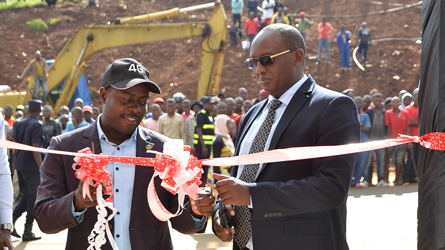 Rusizi Mayor and Mark Karomba, the Chief Human Resource Officer at KtRn cutting the ribbon during opening ceremony of 4G Square Rusizi.