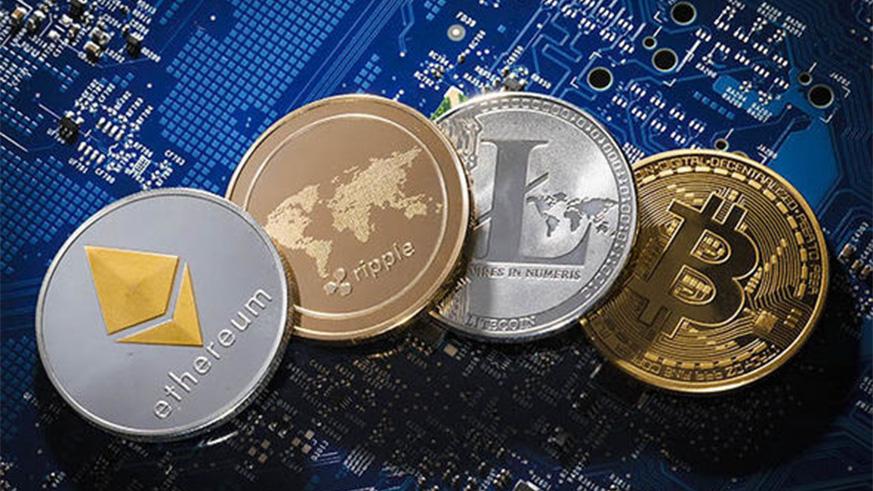 Participants chat as they follow the discussion of Blockchain technology in Kigali on Tuesday (Sam Ngendahimana)