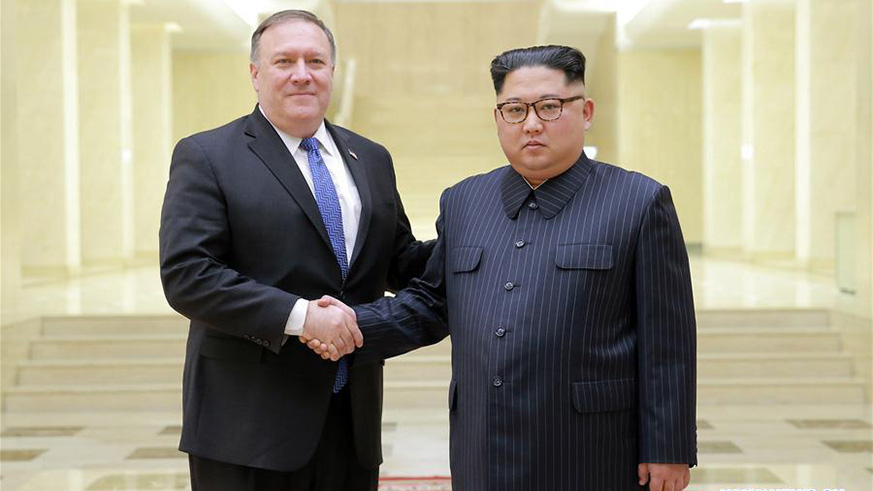 Kim Jong Un (R), top leader of the Democratic People's Republic of Korea (DPRK), shaking hands with visiting U.S. Secretary of State Mike Pompeo. (Net photo)
