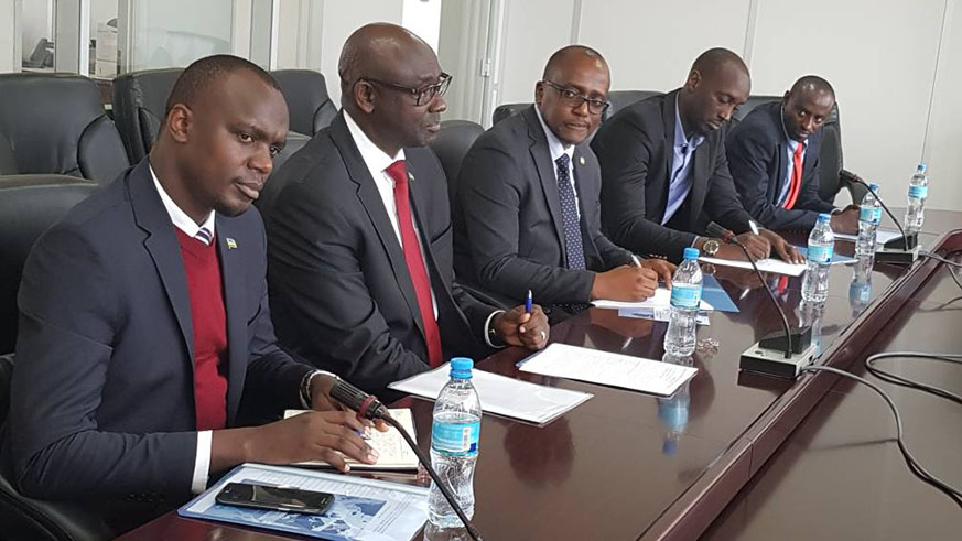 Busingye (2nd left) during his meeting with MICT officials. Courtesy.
