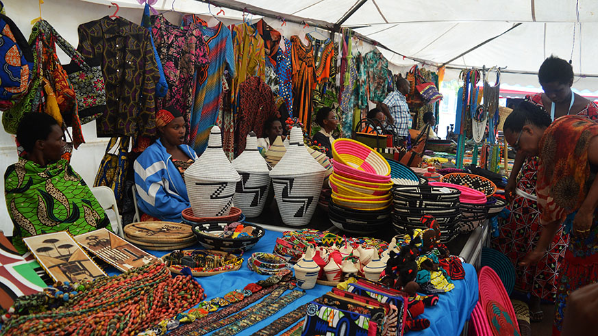 Exhibitors showcase their products in Kigaliu2019s Car Free Zone, one of the places to visit after TAS in Kigali. Sam Ngendahimana.