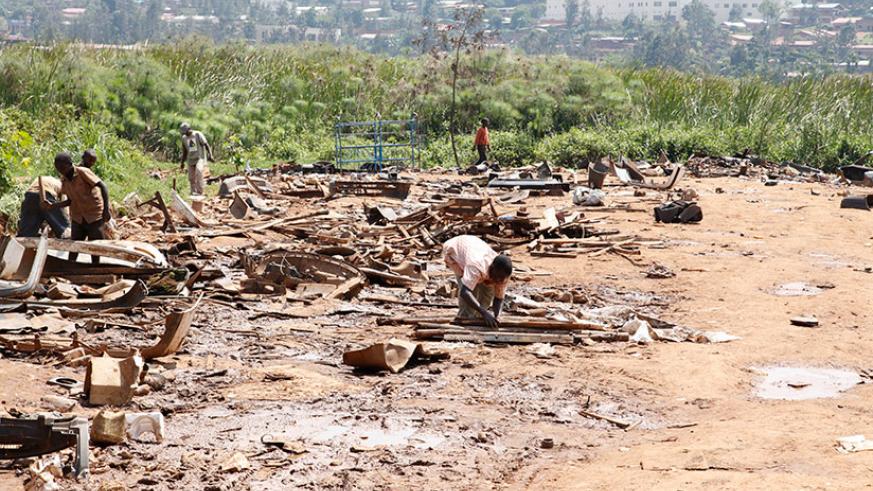 Residents are evacuated from Nyabugogo wetland. Rwanda Environment Management Authority has warned wetland encroachers that the law will catch up with them. File.