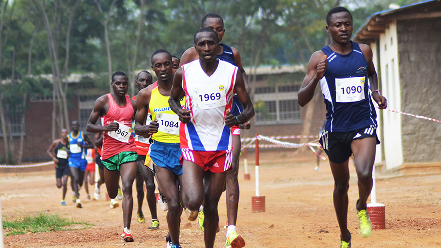 Rwanda's long distance runner James Sugira leads other athletes during a Cross country race. Sam Ngendahimana.