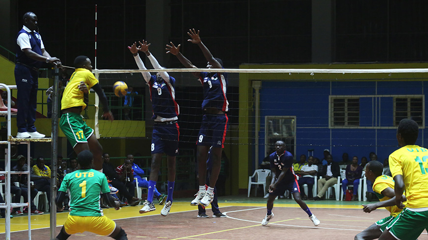 REG attempt a block against UTB during their first playoff at Petit Stade, Remera. Sam Ngendahimana.