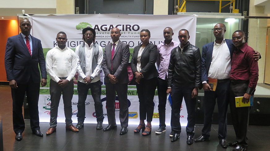 Agaciro Development Fund officials and campaign partners in a group photo.  Photos by Eddie Nsabimana.