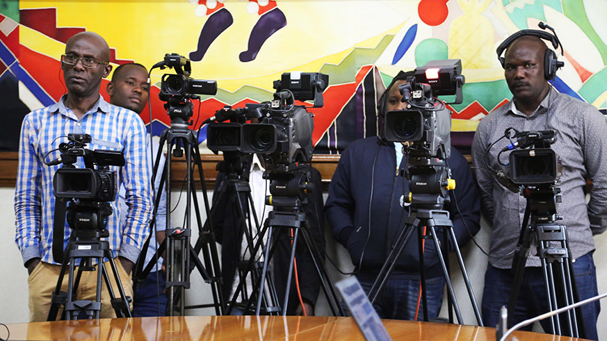 Journalists follow Prime Minister's notes during the meeting yesterday (Sam Ngendahimana)