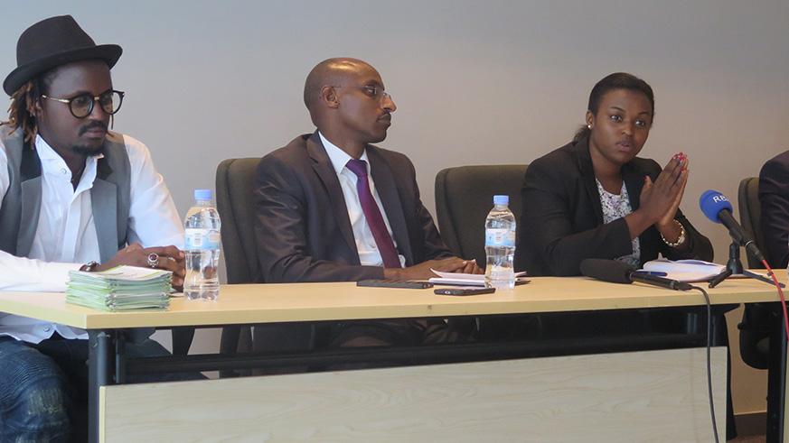 L-R: Riderman, one of the artistes who featured on â€˜Agaciro Kanjyeâ€™ song, represented his fellow artistes at official launch of the campaign song. Francine Uwamariya [right], the Agaciro chief shared services officer, speaks during a news conference on Friday. 