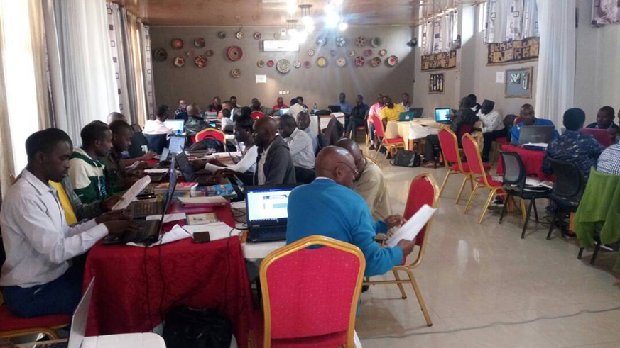 One of the teams  of content writers for in- house textbook production initiative concentrating on their machines writing differents books for pre-primary to secondary schools. Regis Umurengezi