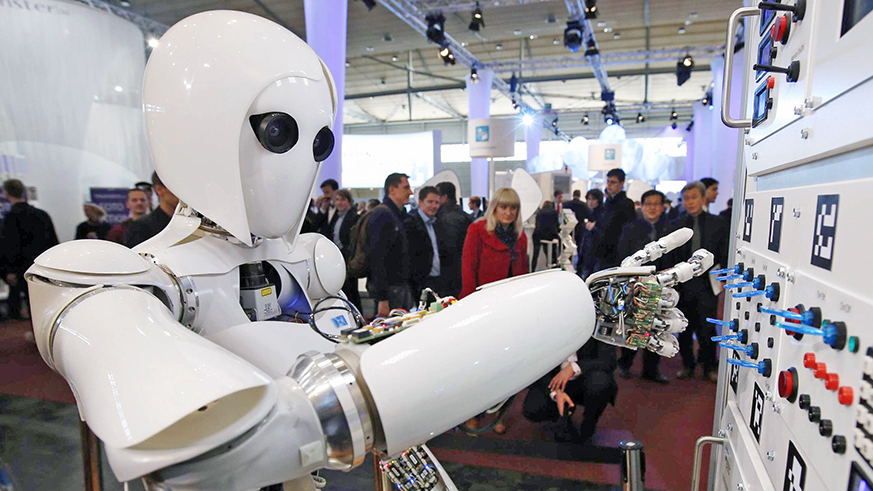 The humanoid robot AILA (artificial intelligence lightweight android) operates a switchboard during a demonstration by the German research centre for artificial intelligence at the CeBit computer fair in Hanover in 2013. Net photo.