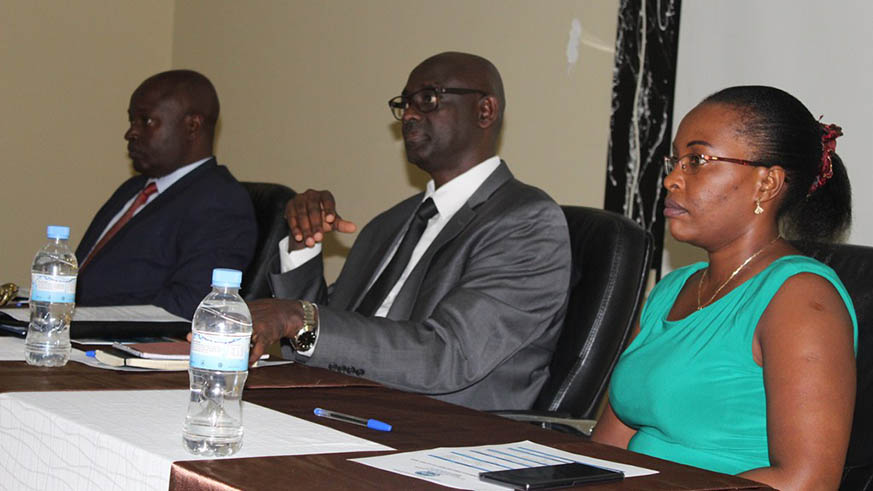 L-R: Rwanda Investigation Bureau (RIB) Secretary General, Jeannot Ruhunga; Minister for Justice Johnston Busingye and RIB Deputy Secretary General Isabella Kalihangabo speaking to the agencyâ€™s staff at the start of a three-day retreat in Nyamata on Friday. Sam Ngendahimana.