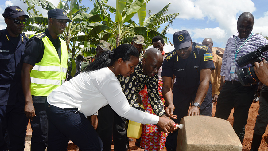 Police and partners inaugurating a clean water source in Kirehe, last year.