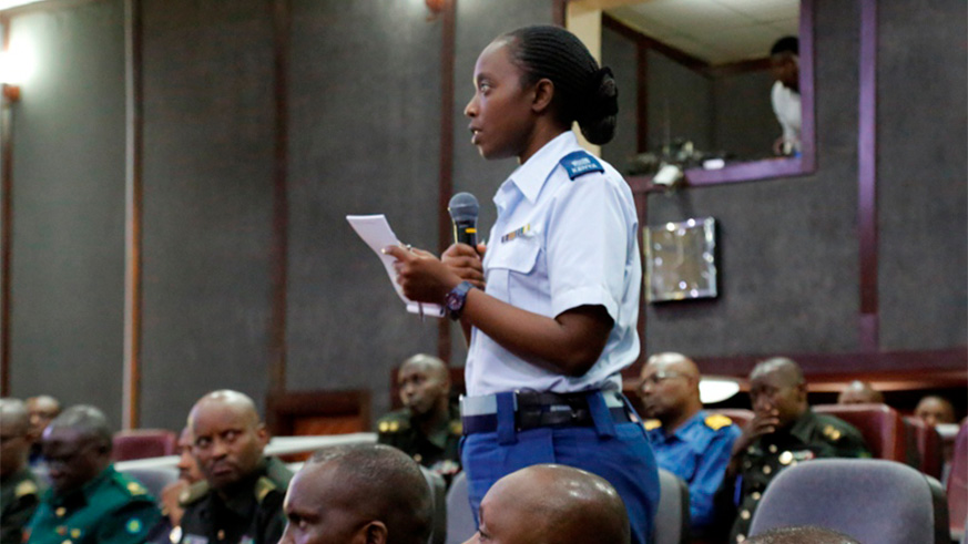 A participants speaks during the National Security Symposium opened at the Rwanda Defence Force Command and Staff College