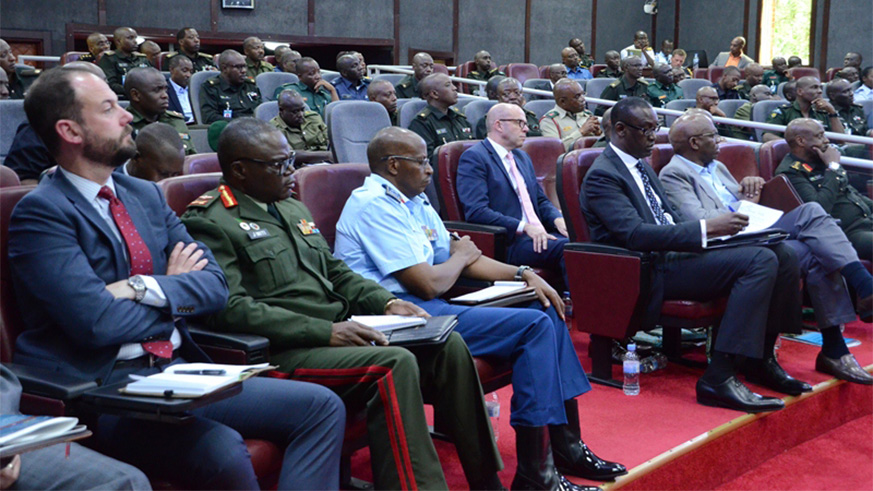 Participants follow proceedings