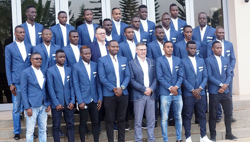 Rayon Sports squad and officials pose for a group photo ahead of their departure to Dar es Salaam for their CAF Confederation Cup Group D clash slated later today. Courtesy.