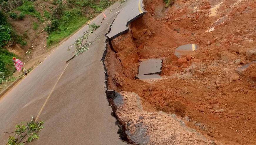 Part of the road that was destroyed . Courtesy.