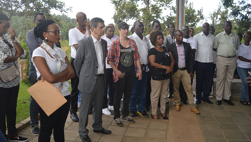 Bollore MD, Gilles Schwarz, together with staff members observe a minute of silence to honour the victims of the 1994 Genocide against the Tutsi at KGM. 