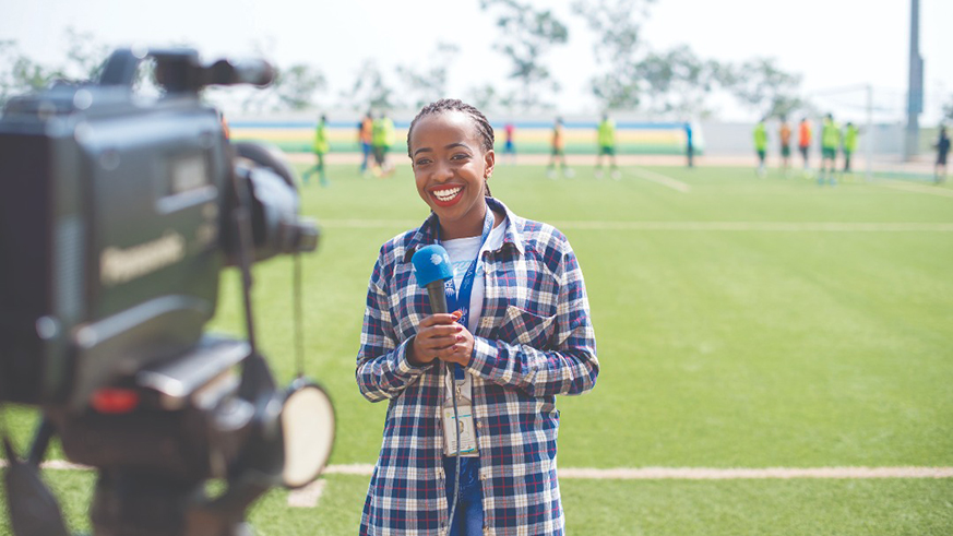 Uwamahoro prepares for live coverage at Amahoro National  Stadium. 