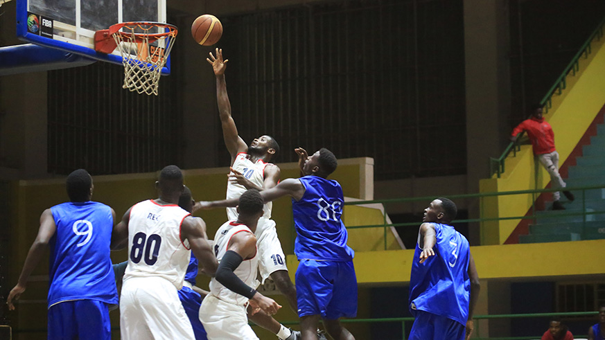 Olivier Shyaka drives to the basket during a past match against Epoir at Petit Stade, Remera. REG will face Espoir in Genocide Memorial Tournament today. Sam Ngendahimana.