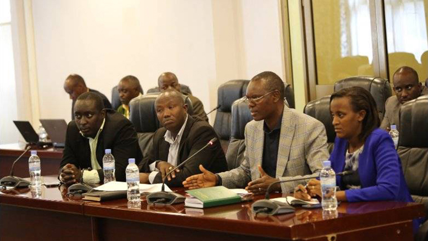 Callixte Kanamugire (second right), the Chief Advocacy Officer at PSF, addresses members of the Parliamentary Standing Committee on National Budget and Patrimony last week. Courtesy.