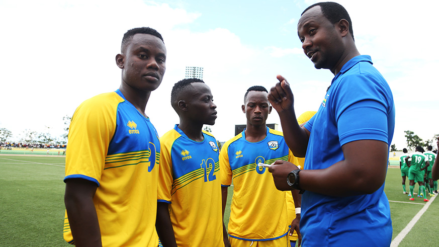 U20 Amavubi head coach Mashami gives instructions to his players before the first leg against Zambia last week. Sam Ngendahimana.