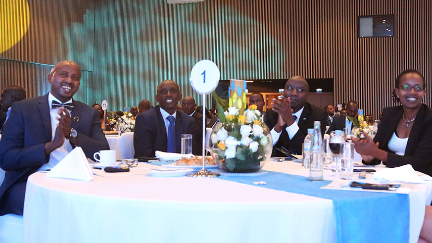 L-R: Arthur Asiimwe, Director General of RBA; Francis Kaboneka, Minister for Local Government, Prime Minister u00c9douard Ngirente and Florence Batoni, the Chairperson Board of Directors of RBA during the 55 years anniversary celebration of RBA at Kigali Convention Center on Friday. Sam Ngendahimana.