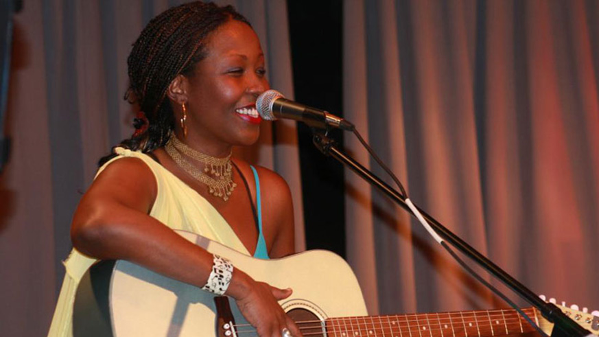 Canada-based Rwandan musician Ninette Nyiringango plays the guitar. /File photo  