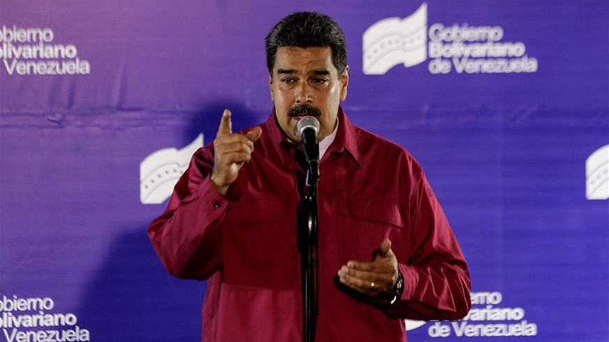 Venezuelan President Nicolas Maduro delivers a speech during a press conference after casting his vote in a polling center in Caracas. (Net photo)