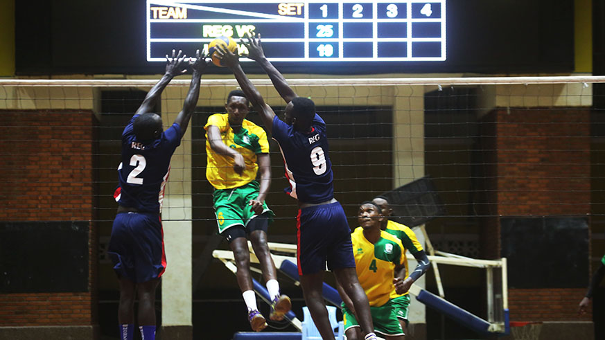 REG players try a block during their recent playoff against UTB. Sam Ngendahimana.