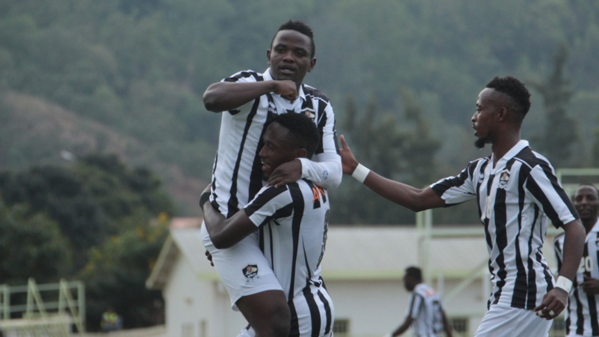 Hakizimana celebrates his goal with Bizimana.