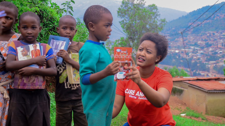 Gloria Gatsinzi provides vulnerable children with scholastic materials. / Courtesy