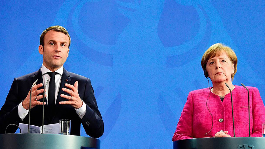German Chancellor Angela Merkel and French President Emmanuel Macron address a joint press conference. Net