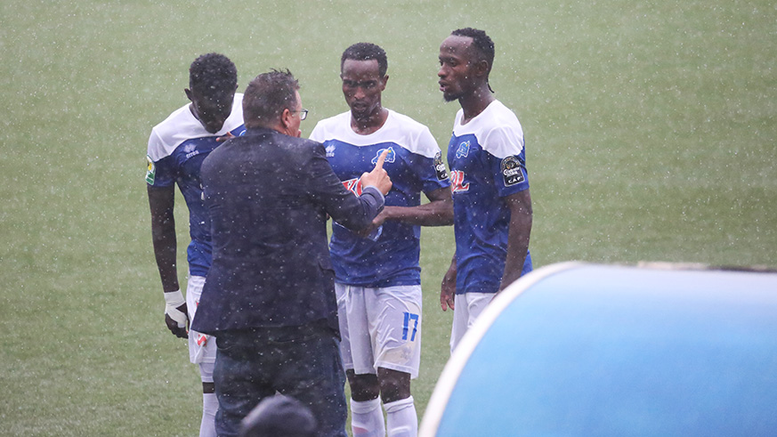 Minnaert speaks to his players in the second half.