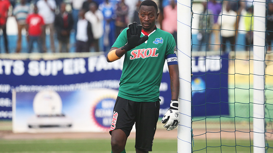 Skipper Jean Luc Ndayishimiye talks to his teammates as Etincelles get a free kick in the second half.
