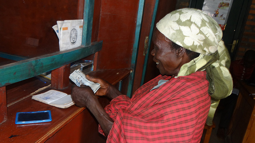 A woman visits a microfinance organization. Net.