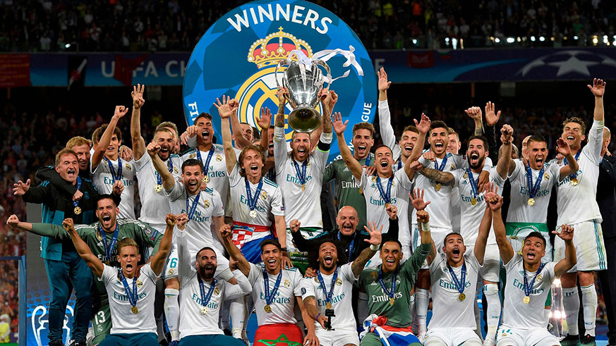 Sergio Ramos holds the Champions League trophy aloft after Real Madridu2019s win. Net photo.