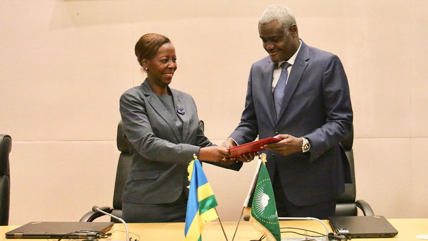 Rwanda's Minister of Foreign Affairs Louise Mushikiwabo submitting instruments of ratification of the African Continental Free Trade Area to African Union's Chairperson Moussa Faki Mahamat. Courtesy. 