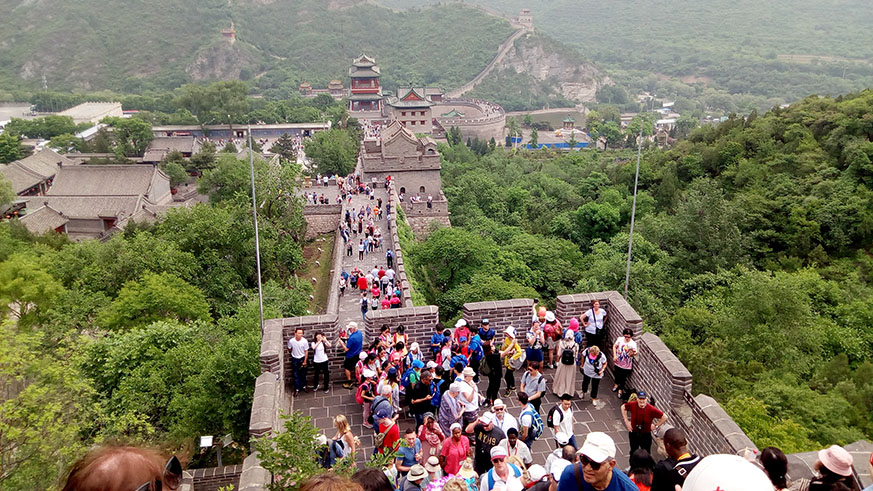 Tourists climb the Great Wall of China, the crowd seen down were on the first stage. Elisee Mpirwa