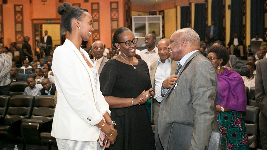 First Lady Mrs Jeannette Kagame with Mr. AndrÃ© Twahirwa and Ange Kagame at the CafÃ© LittÃ©raire. Courtesy