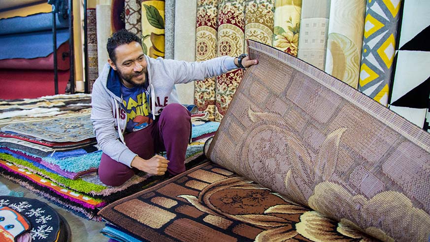 An Egyptian exhibitor displays carpets during last yearu2019s  Egypt and Middle East Expo in Kigali. File. 