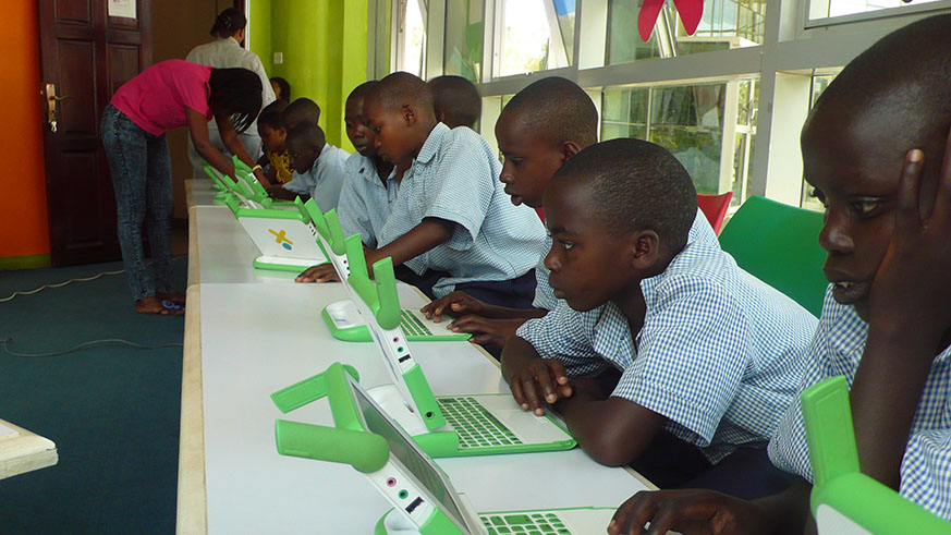 Pupils use laptops during a computer lesson in Kigali. File.