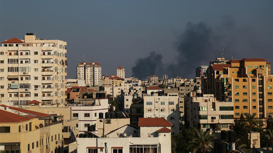 Smoke rises following an Israeli air strike on the Palestinian coastal enclave in Gaza City, on May 29, 2018. Israel launched a massive airstrike on the Gaza Strip on Tuesday, hitting 35 targets and a tunnel crossing into Egypt and Israel, said the Israeli military in a statement. The statement said the airstrike was in response to a barrage of 28 mortar shells that Gaza militants fired at Israel on Tuesday morning. / Xinhua/Stringer